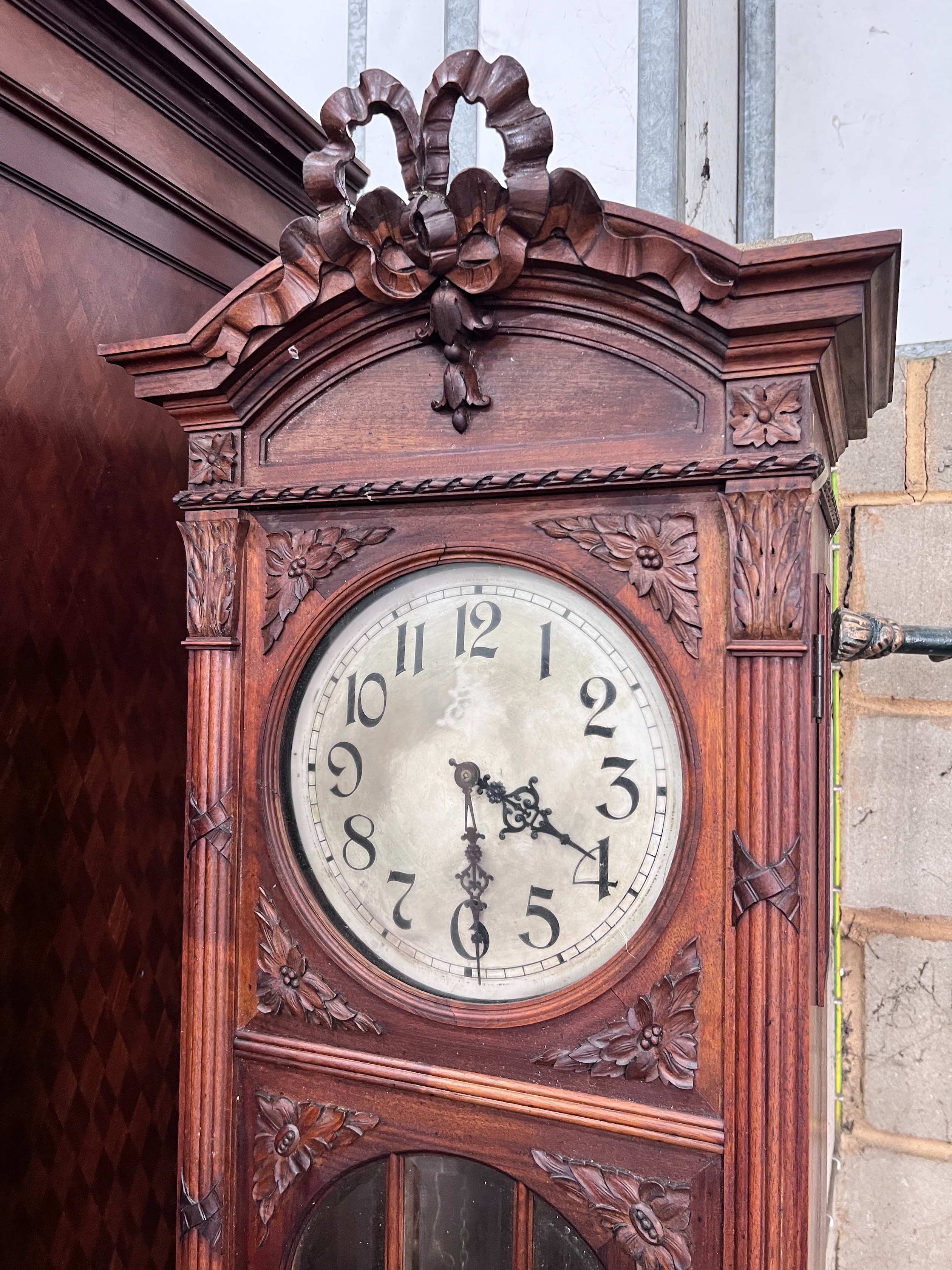 An early 20th century French carved walnut thirty hour longcase clock, height 224cm *Please note the sale commences at 9am.